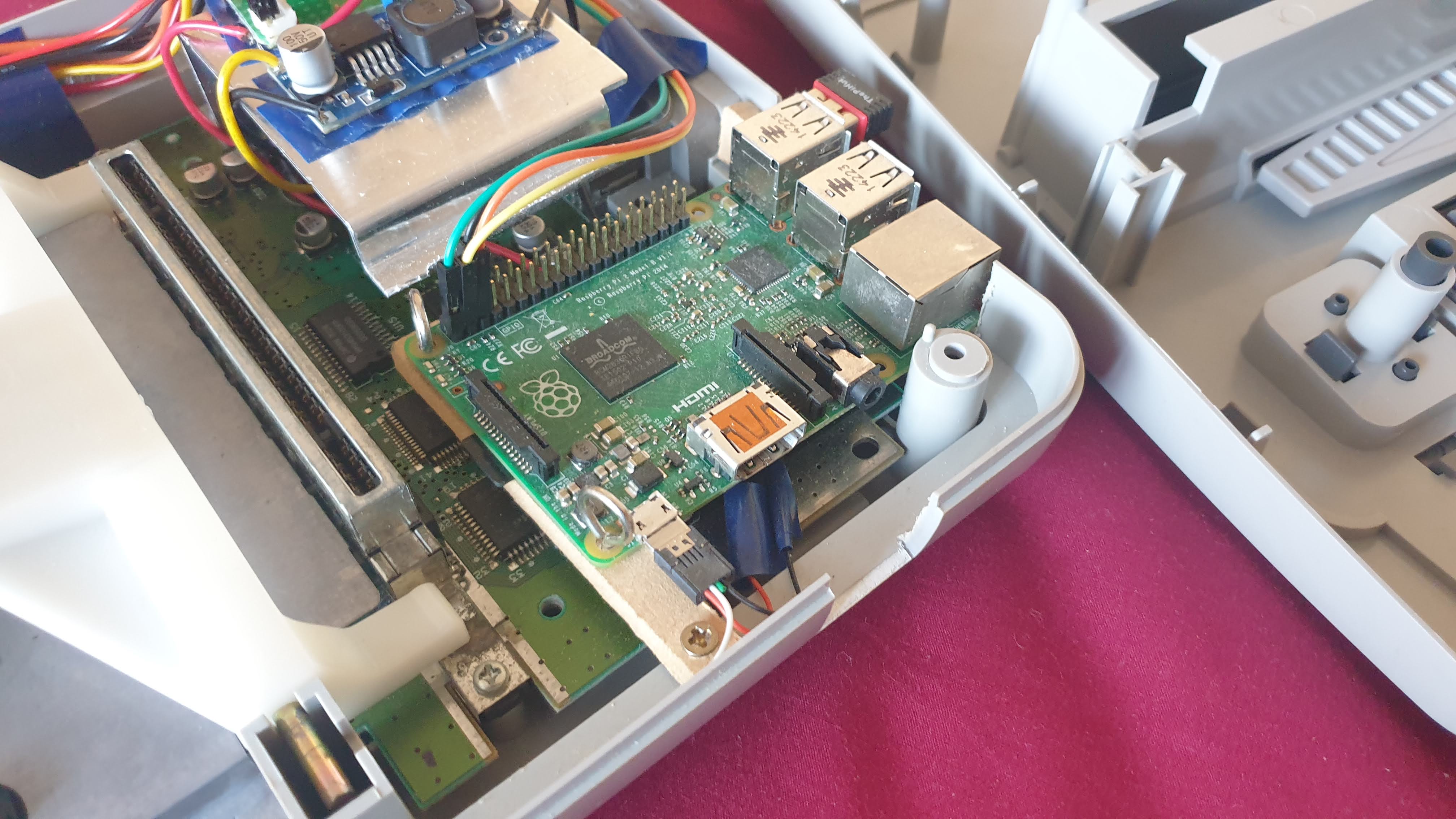 Picture of the Pi being screwed in?