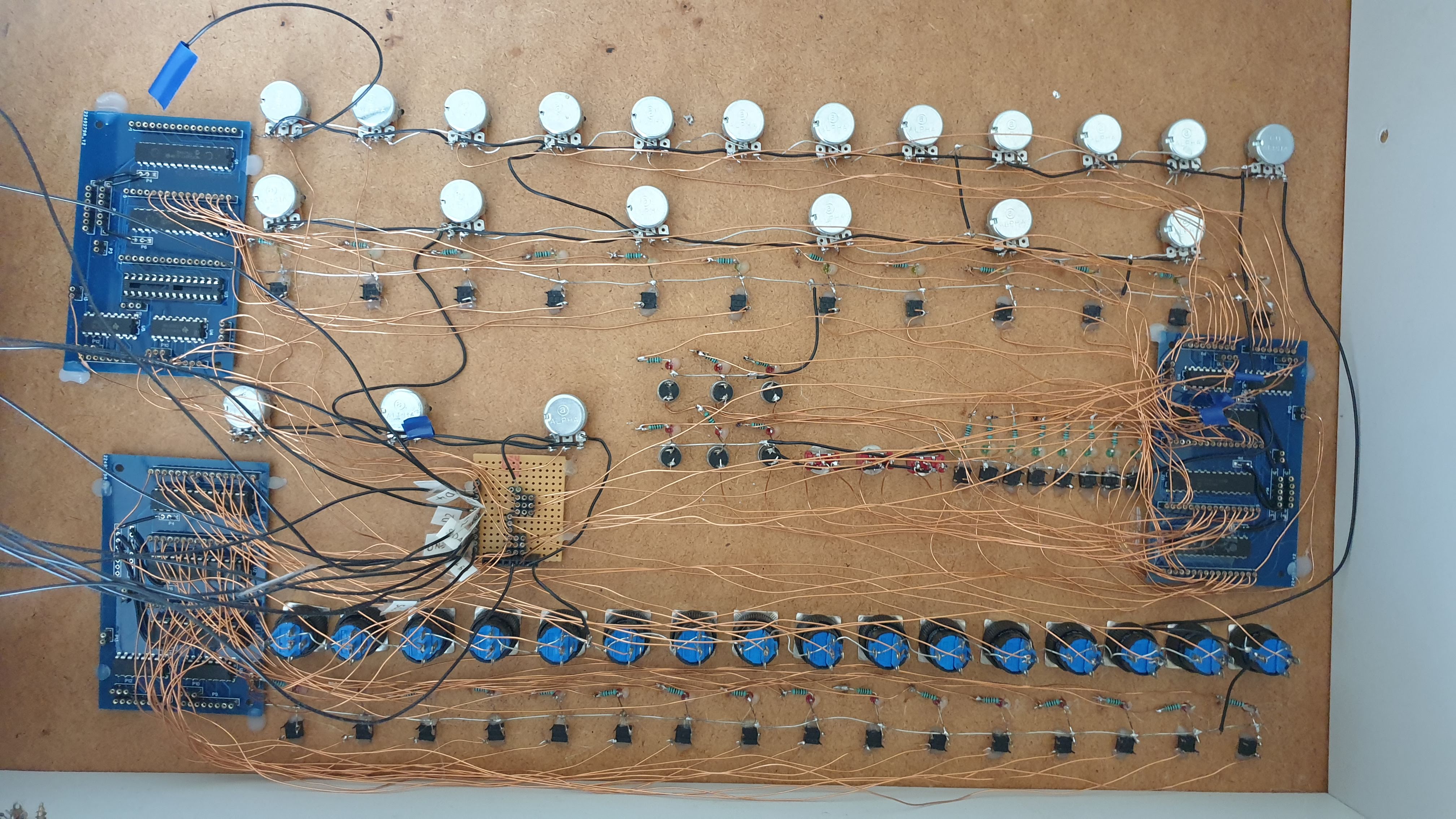 Picture of panel rear with wiring and soldered components